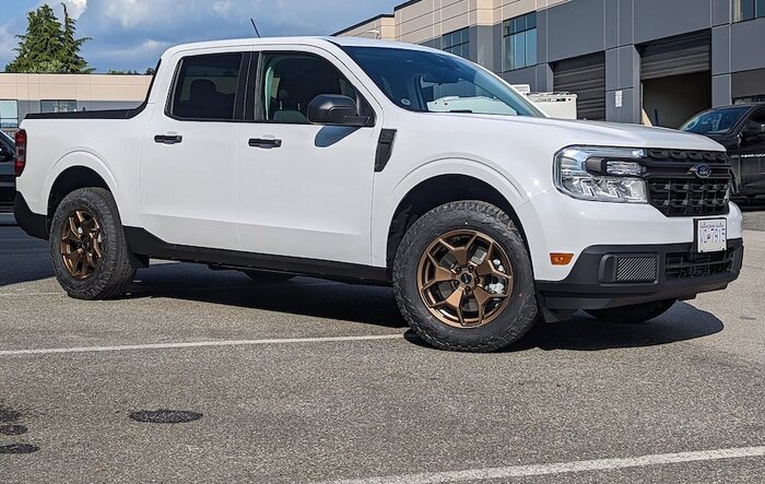 Bronze painted RTX ranch wheels on Oxford White Maverick
