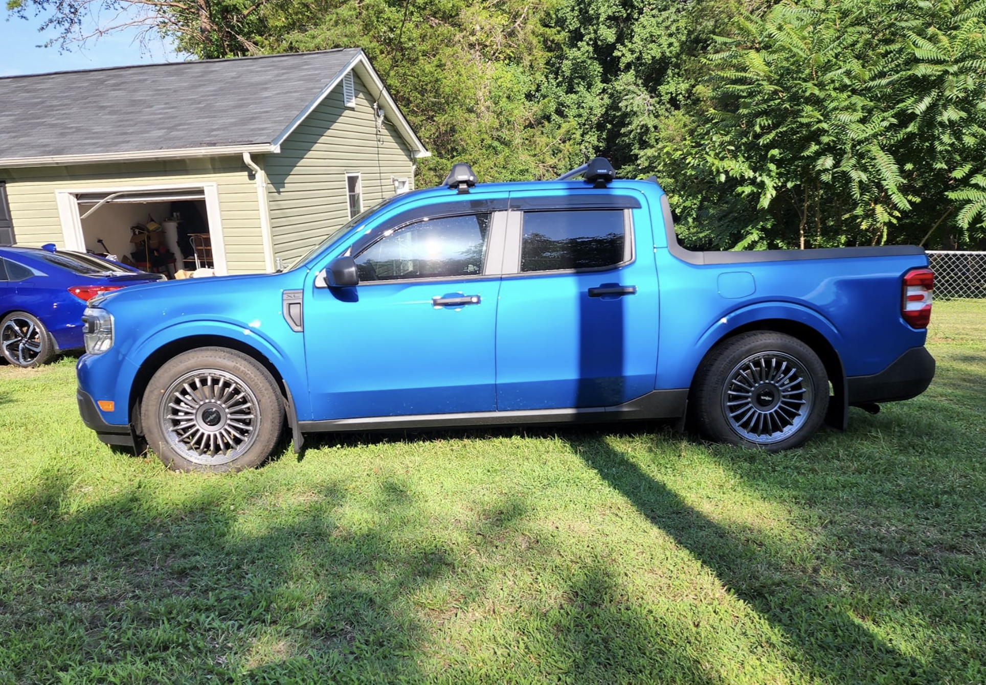 19" Rotiform BUCM wheels on Velocity Blue XL Maverick